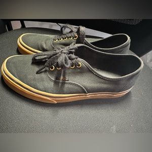 Black & tan Van Shoes. Men’s size 9/Women’s size 10.5. Used but good condition.